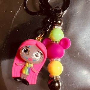 Disney Doorables key chain and earrings